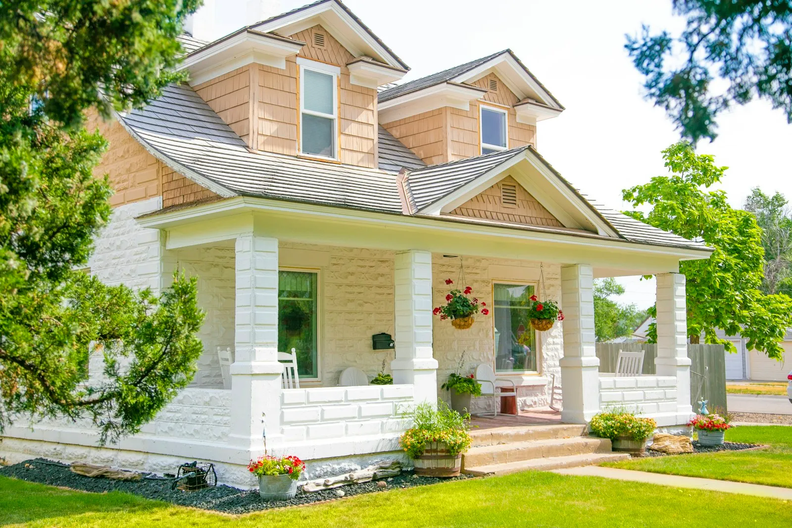 A well-kept Central Ohio home with an asphalt-shingle roof restored by Shingle & Restoration Services